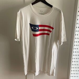 Oakley White Tee with Red and Blue Flag Design